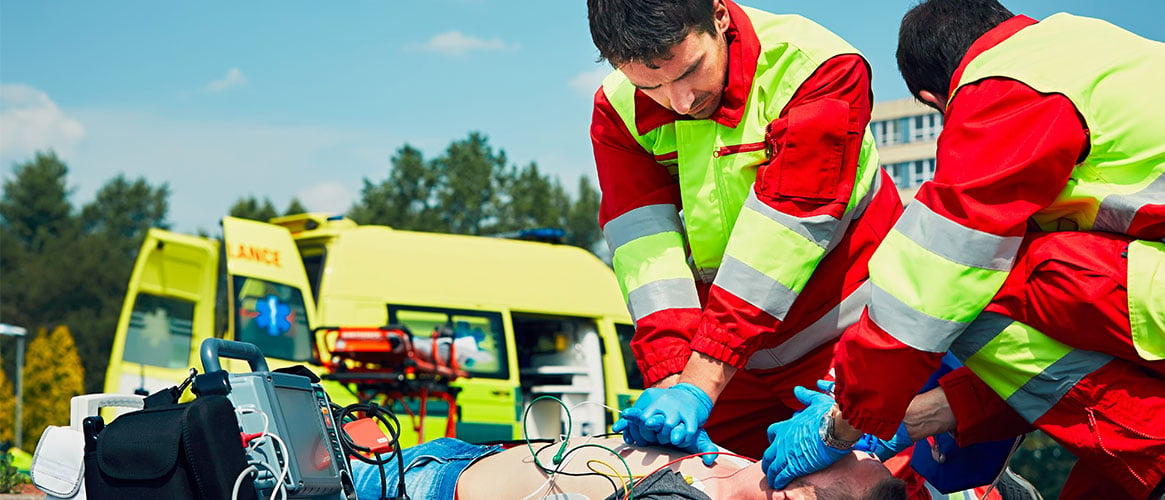 EMS workers providing emergency care to a patient