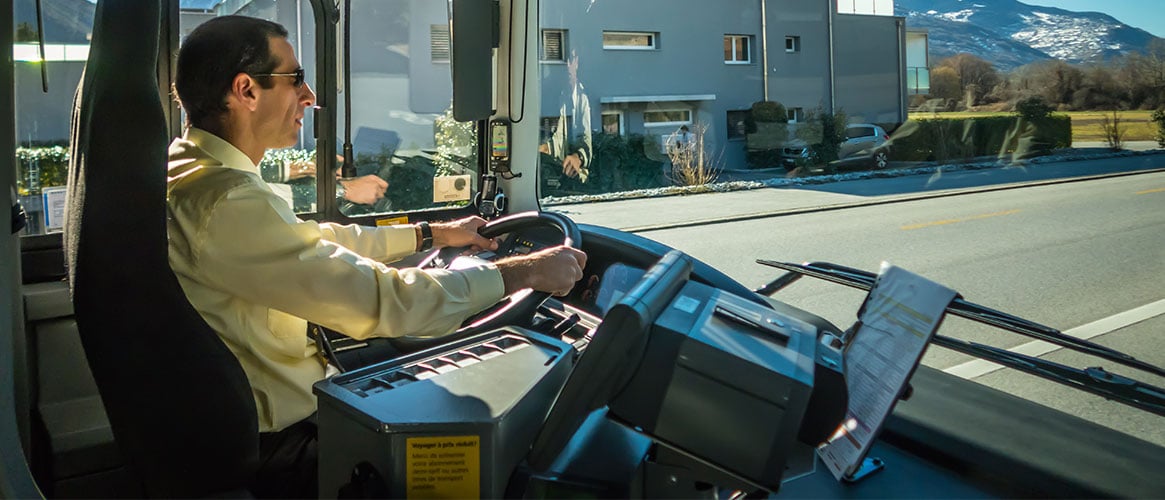 Bus driver experiencing whole body vibration while the large vehicle is in motion.